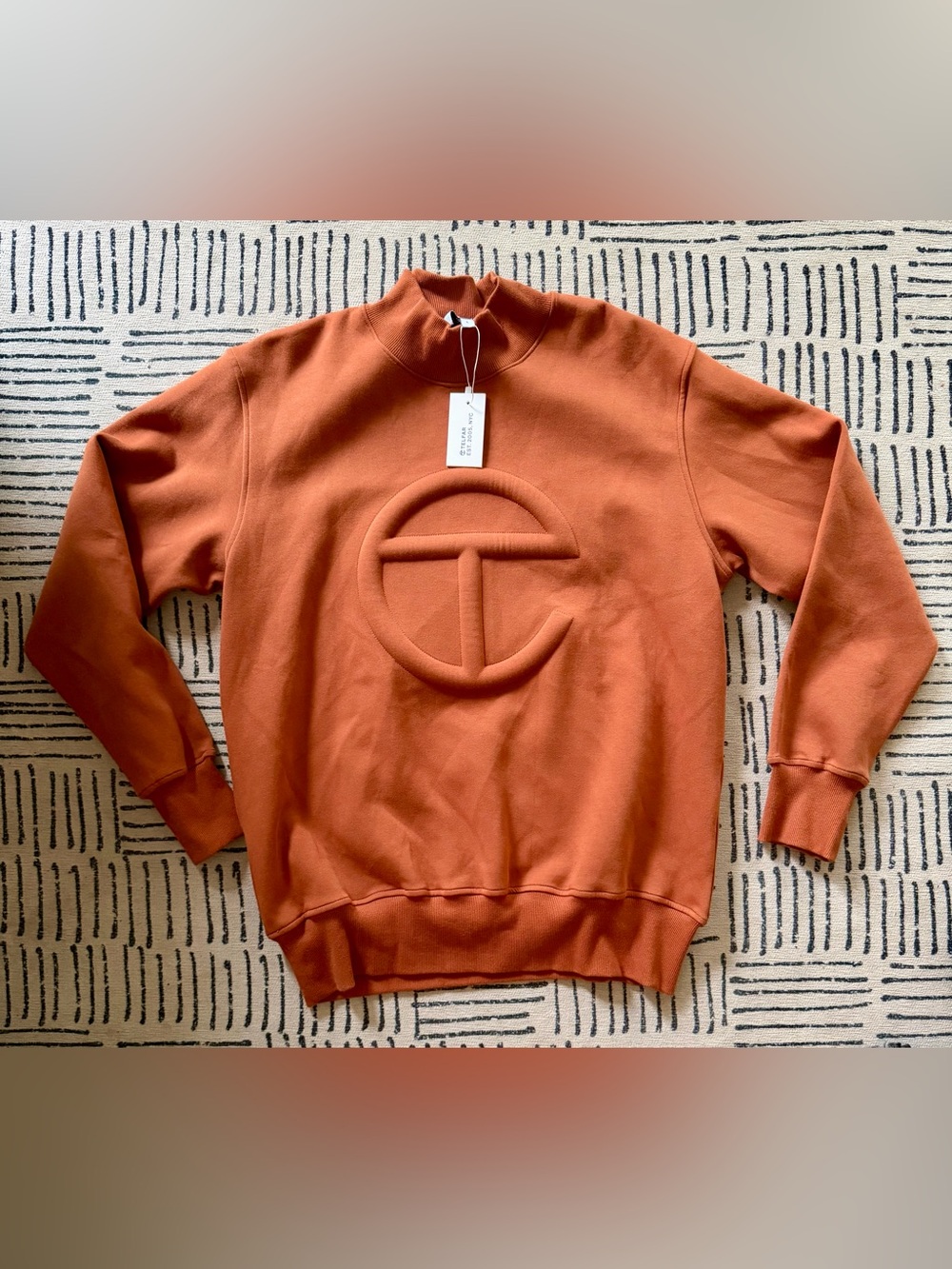 Telfar embossed mock neck sweatshirt